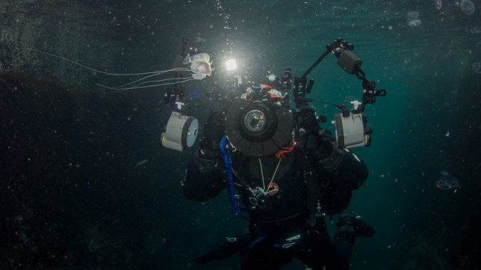 George Stoyle photographing underwater