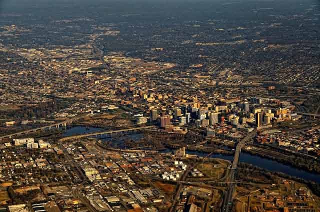 Aerial Photography: cityscape showing skysrapers, bridgess and river by Allen Moore.