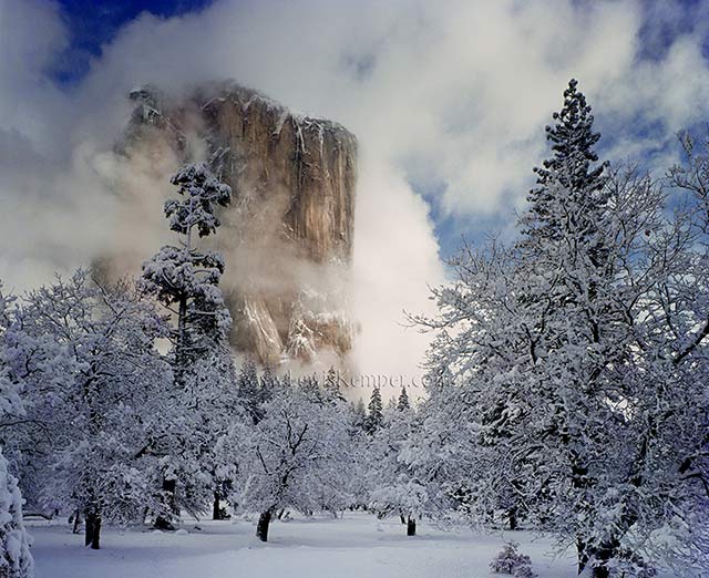 Landscape image of light on El Capitan in the winter, Yosemite National Park, California by Lewis Kemper.