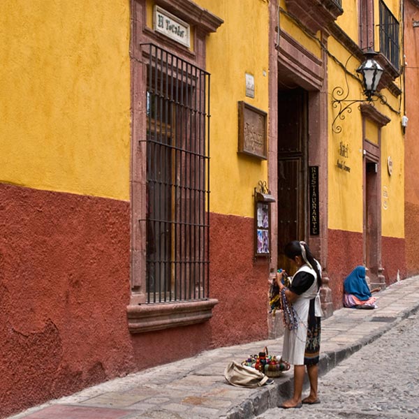 Photo of woman on the street in San Miguel de Allende, Mexico by Randy Romano
