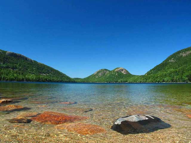 Acadia National Park, Maine: clear waters of Jordan Pond with the Bubbles (hills) in the background by Juergen Roth.