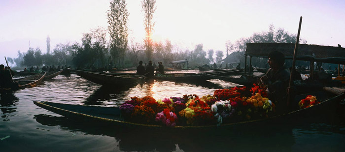 Photo of floating market at sunrise in Dal Lake, Kashmir by Ron Veto
