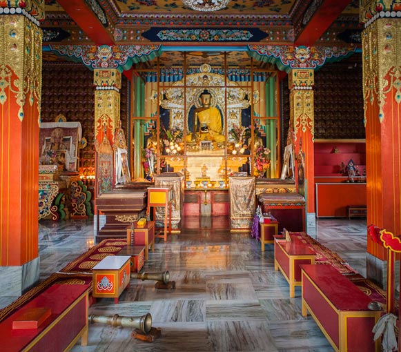 Photo of interior of monastery at Bodhgaya, India by Nico DeBarmore.