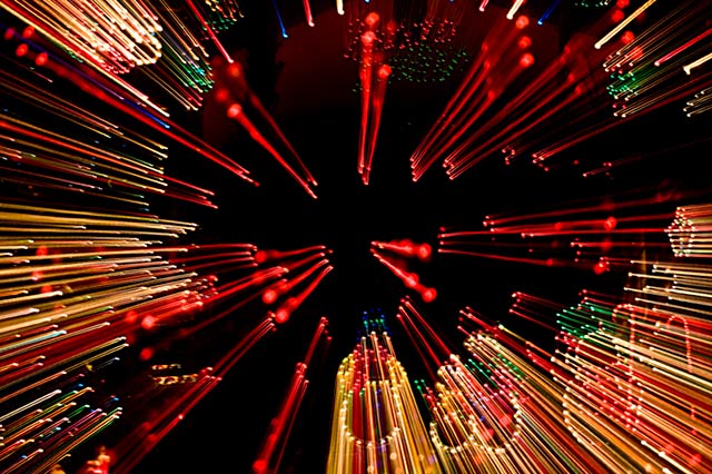 Photo of Christmas lights made while zooming the camera lens by Noella Ballenger.