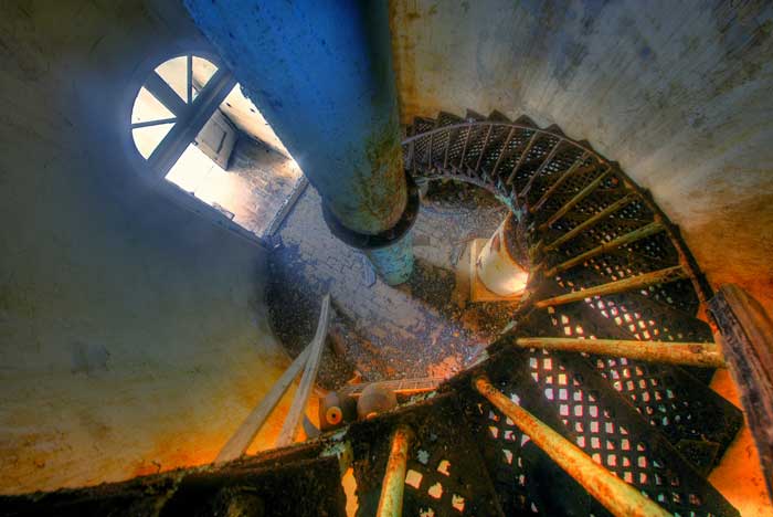 HDR image of winding metal staircase inside the Bird Rock Cay Lighthouse on Crooked Island in the Bahamas by Jim Austin