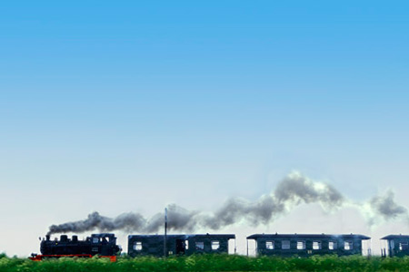 Photo showing extremely low horizon: train engine and cars by Gert Wagner.