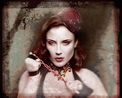 Sepia toned photo of female model with red hat and chain from the grunge series by hybrid model photographer Juul de Vries.