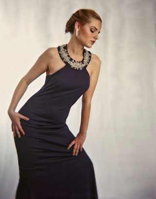 Holga camera image: Nicole shows a sleeveless T-back gown with beaded neck and jeweled trim, by Chanlé Encore by Allen Moore.