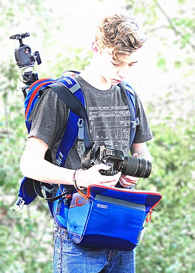Image of a photographer using the rotating beltpack of the MindShift Gear’s rotation180°® Trail™Backpack by Marla Meier.
