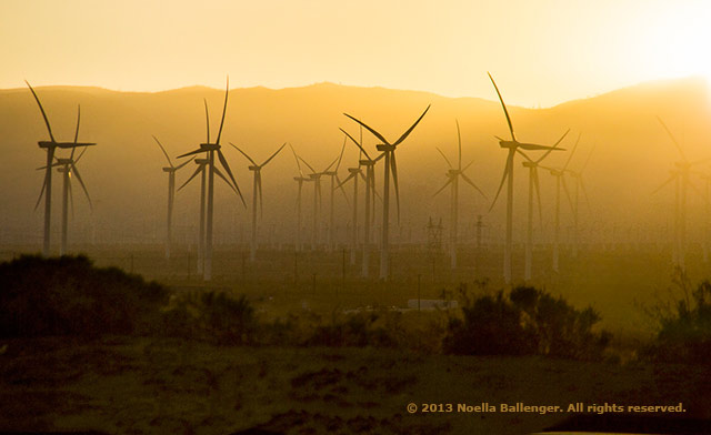 Photo of a wind farm in Mojave, California made at sunrise using a fast shutter speed by Noella Ballenger.
