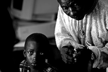 Photo portraid of Haddi at eye clinic, Ghana, Africa by Marielle van Uitert