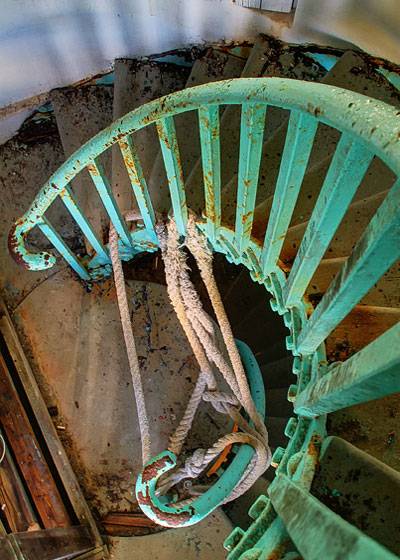 HDR image: Staircase up the torquoise green Great Stirrup Lighthouse in the Bahamas by Jim Austin.