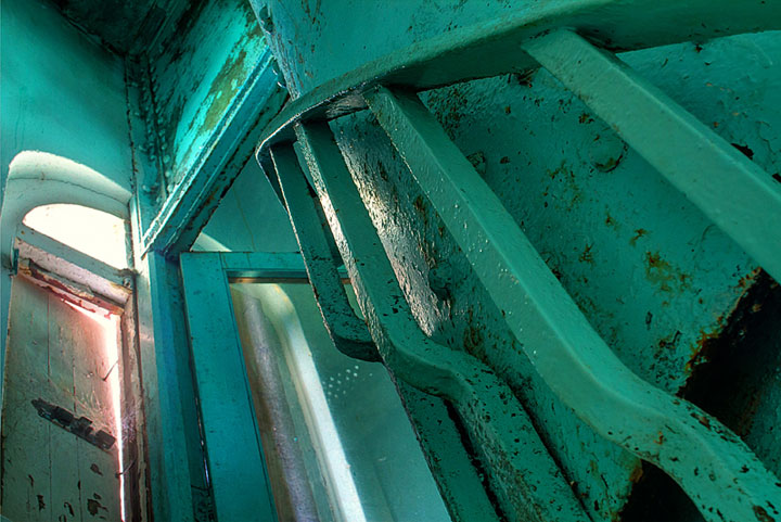 HDR image: The green Great Stirrup Lighthouse bannister and upper doorway in the Bahamas by Jim Austin.