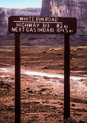 Sign in canyonlands in Utah saying how many miles to the next gas station by Noella Ballenger.