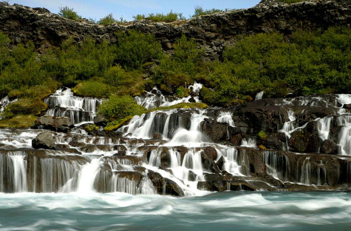 Photo of waterfalls at Hraunfoss in Iceland by Andy Long