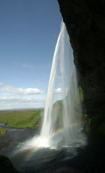 Photo of waterfall, landscape and rainbow at Seljalandsfoss, Iceland by Andy Long