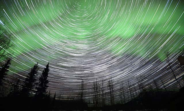 Photo stacking of the stars with the Aurora Borealis using the StarStax software by Andy Long.