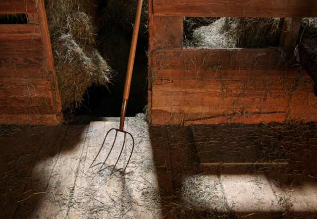 Photographing Historial Place: Pitchfork and hay inside the barn at Kuerner Farm by Gary Anthes.