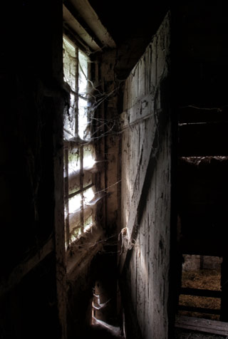 Photographing Historial Place: Window and window light on a door inside the barn at Kuerner Farm by Gary Anthes.
