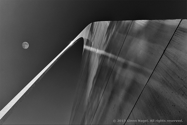 Composite black and white image of the Gateway Arch and moon in St. Louis, Missouri by Glenn Nagel.
