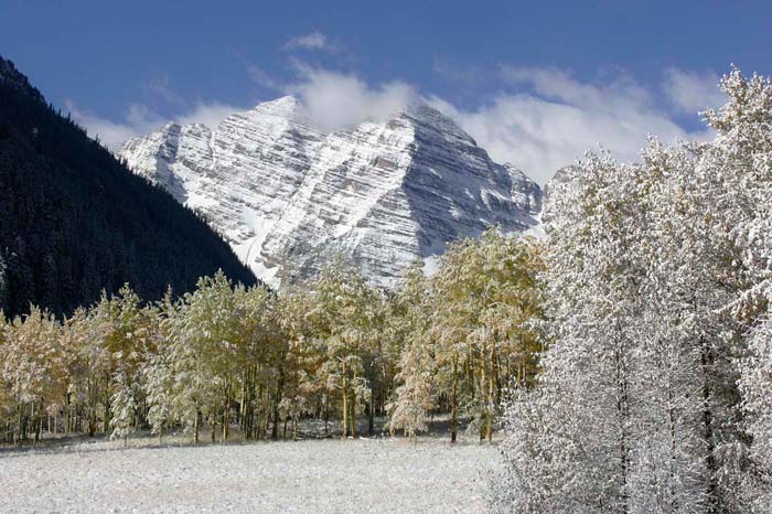 Photo of Maroon Bells, Aspen, Colorado with snow and fall colors by Andy Long