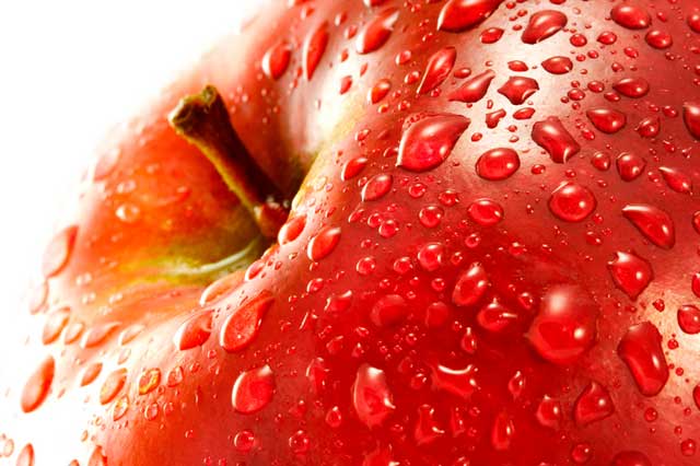 Macro photo of red apple with water drops from shutterstock.com.