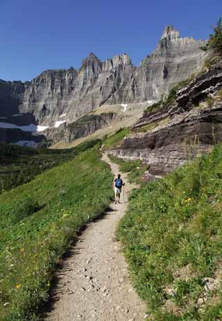 Photo adventures day hike: hiker on Rich Mountain Trail, Glacier Mountain National Park by Jeff Doran.