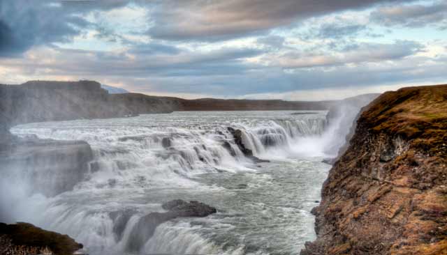 Photographic Travels in Iceland: Image of rushing waters of the Goðafoss Falls by Michael Legerro.