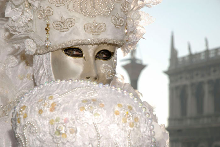 Photo of person in costume & mask at the Venetian Carnival by Piero Leonardi