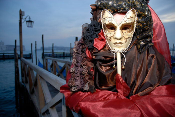 Photo of person in costume & mask at the Venice Carnival by Piero Leonardi