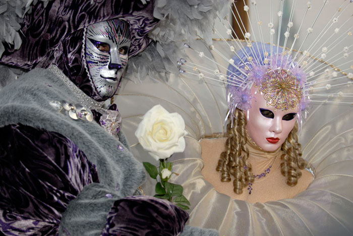 Photo of people in costumes & masks at the Venetian Carnival by Piero Leonardi