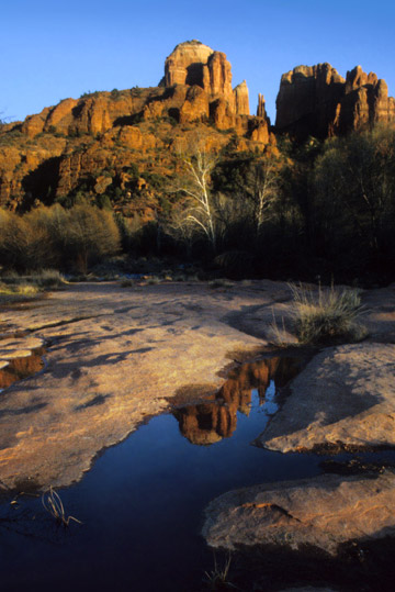 Reflection photo of rock formations in Sedona, AZ by Noella Ballenger