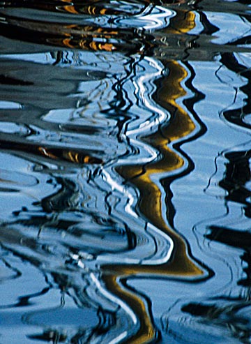 Abstract water reflection photo of boat masts by Noella Ballenger