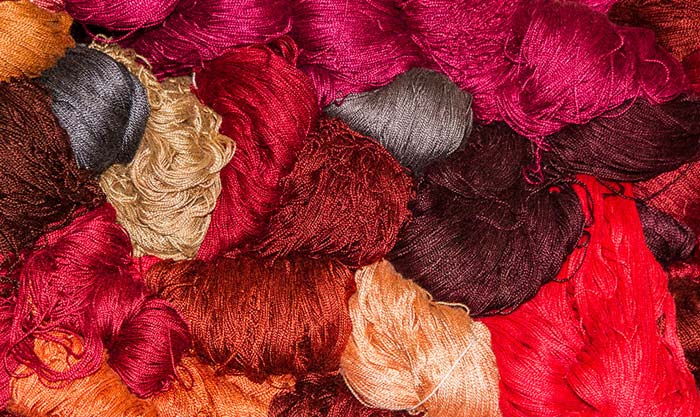 how to make a photo essay. Photo of colorful dyed yarns at West Coast Trimming by Noella Ballenger