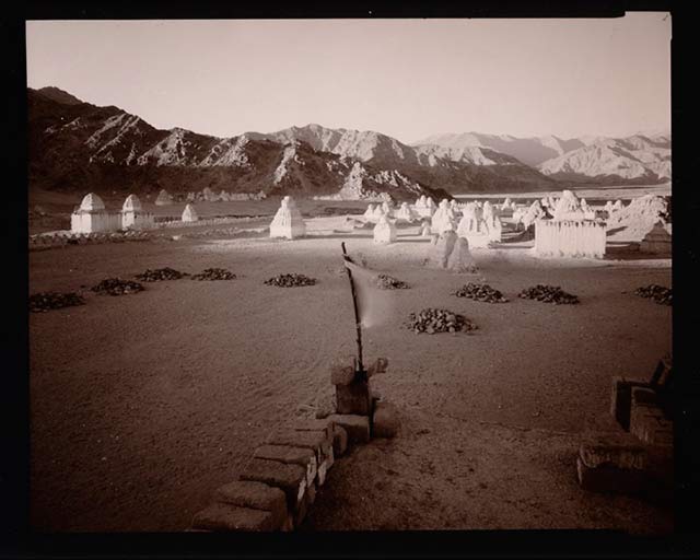 Black and white photo of Prayer Flags and Chortens, Ladakh, India by Linda Connnor.