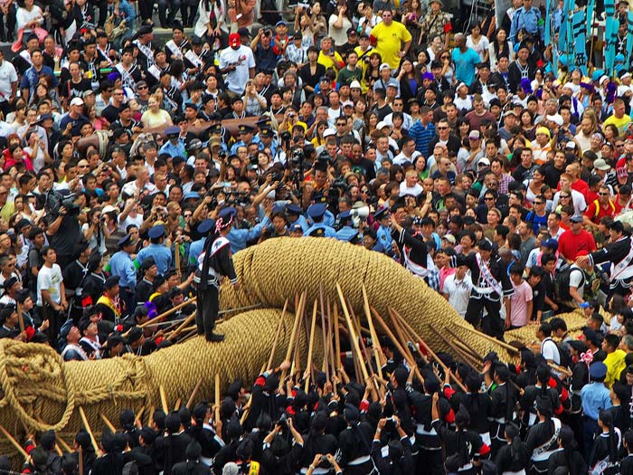 Photo of crowd & 40 ton tug-o-war rope at Naha Matsuri Festival in Naha Okinawa, Japan by Michael Lynch