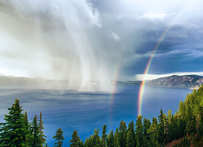 Photo of storm and double rainbow at Crater Lake National Park, Oregon by Duke Miller
