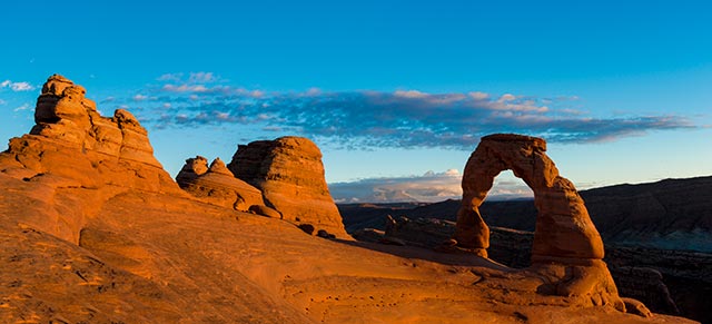Landscape image of rock formations and rock arche at Arches National Park, Utah by Michael Leggero.