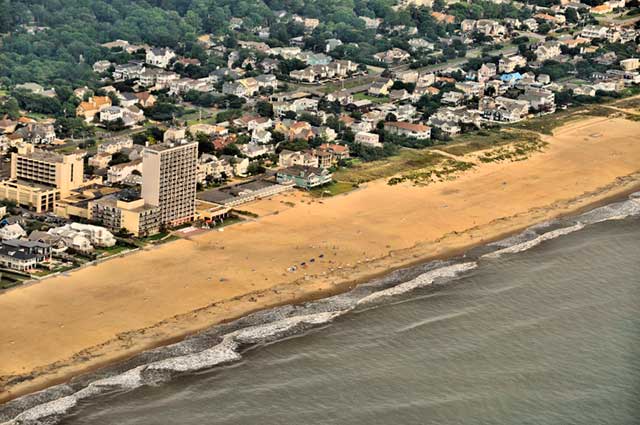 Aerial photo of the water, beach and town of Virginia Beach by Allen Moore.