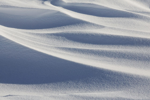 photographing snow. Close-up image of a snow field showing shapes and patterns by Andy Long.