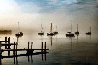 Image of boat dock and sailboats on a foggy morning by James Gordon Patterson.