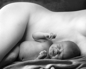 Black and white photo portrait of mother and baby by Monica von Stackelberg