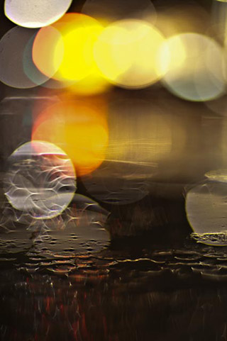 Abstract close-up image of circles of light by Eva Polak.